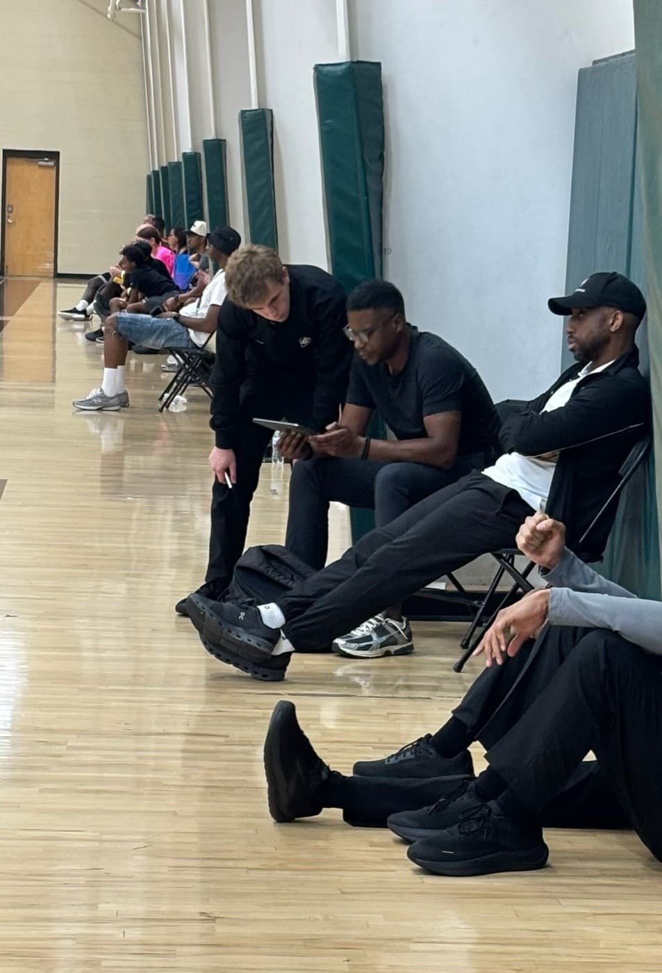 Officials reviewing between sessions at a JD80 camp